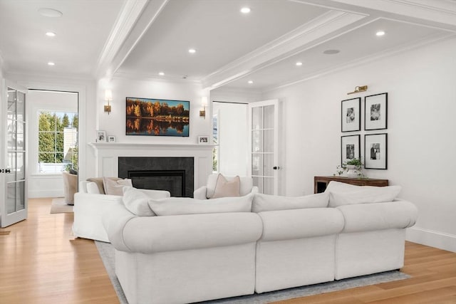 32 S Woodside Ave, Wellesley, MA 02482 - living room with crown molding, light wood-type flooring, a premium fireplace, recessed lighting, and baseboards