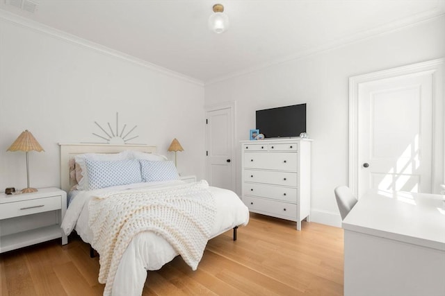 32 S Woodside Ave, Wellesley, MA 02482 - bedroom with crown molding and light wood finished floors