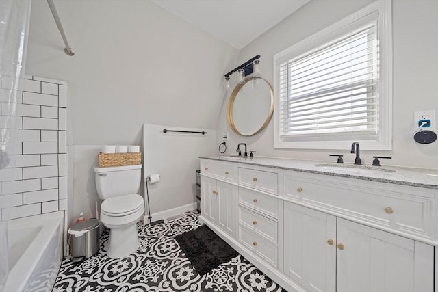 full bathroom with lofted ceiling, tile patterned flooring, vanity, bathtub / shower combination, and toilet