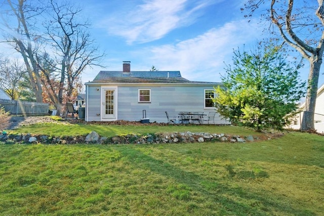 12 Babson St, Wakefield, MA 01880 - back of property featuring a chimney