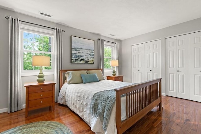 25 Valiant Way Unit 25, Salem, MA 01970 - bedroom with multiple closets, wood-type flooring, and baseboards