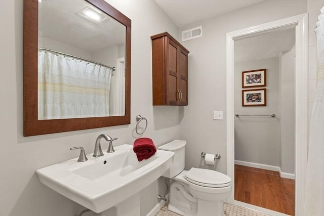 25 Valiant Way Unit 25, Salem, MA 01970 - full bathroom with toilet, a sink, and baseboards