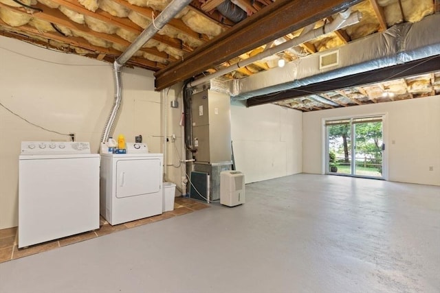 25 Valiant Way Unit 25, Salem, MA 01970 - below grade area featuring separate washer and dryer and heating unit