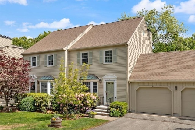 25 Valiant Way Unit 25, Salem, MA 01970 - townhome / multi-family property with a garage, a shingled roof, driveway, and a front lawn