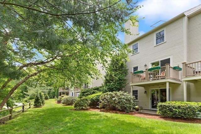 25 Valiant Way Unit 25, Salem, MA 01970 - rear view of property with a chimney and a balcony
