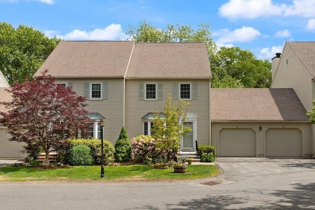 25 Valiant Way Unit 25, Salem, MA 01970 - view of front of home with a garage, asphalt driveway, and a shingled roof
