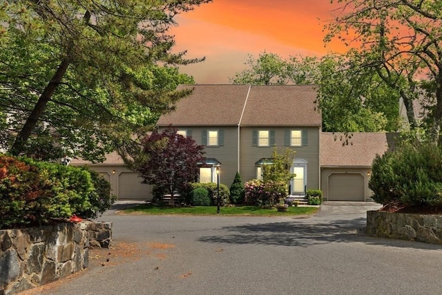 25 Valiant Way Unit 25, Salem, MA 01970 - view of front facade featuring driveway, a garage, and roof with shingles