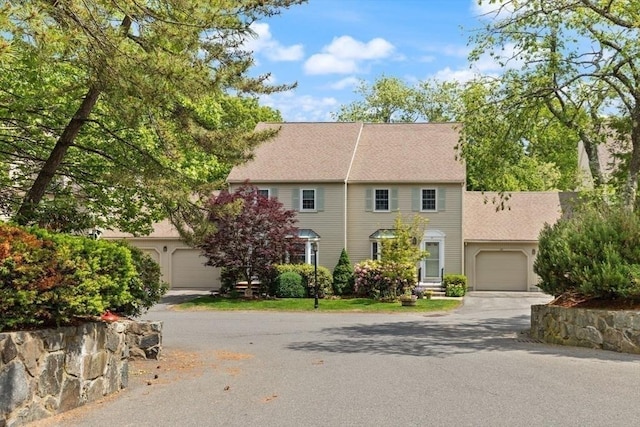 25 Valiant Way Unit 25, Salem, MA 01970 - view of front of home with driveway, an attached garage, and roof with shingles