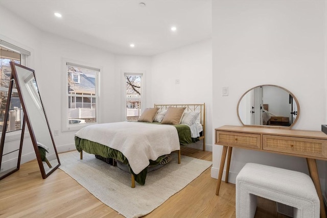 bedroom with light hardwood / wood-style floors