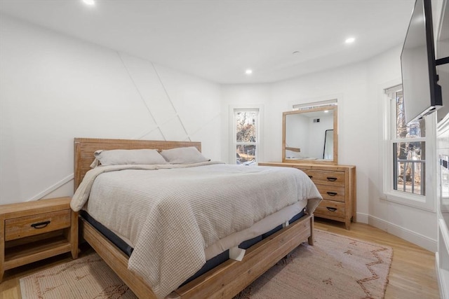 bedroom featuring light hardwood / wood-style floors