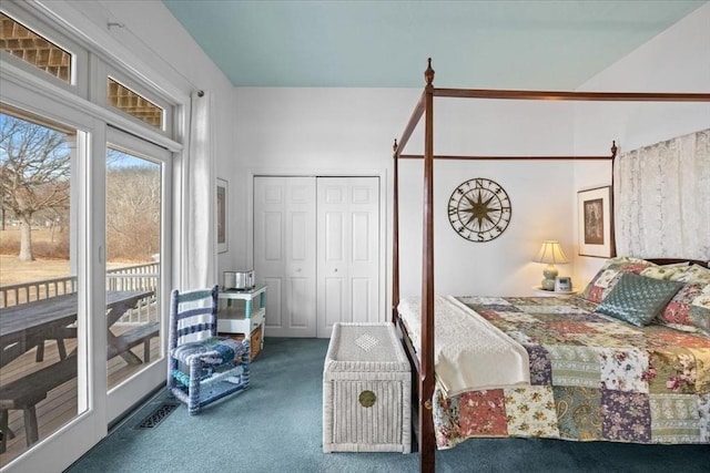 carpeted bedroom featuring access to outside and visible vents