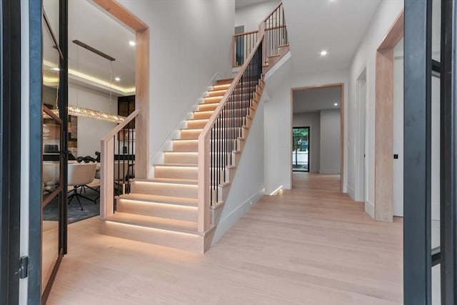 entrance foyer featuring light wood-type flooring