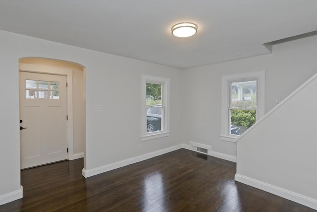 24 City View Ave, West Springfield, MA 01089 - entrance foyer with healthy amount of natural light, arched walkways, and dark wood-style flooring