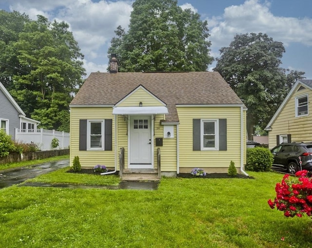 24 City View Ave, West Springfield, MA 01089 - bungalow-style home with a chimney and a shingled roof
