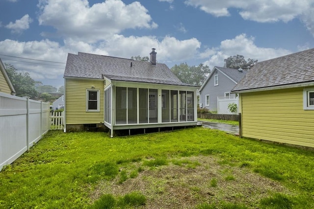 24 City View Ave, West Springfield, MA 01089 - back of house with a sunroom, a chimney, and a shingled roof