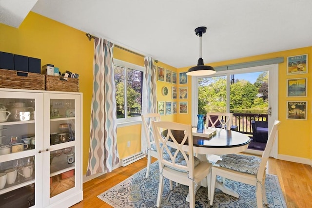 212 Washington St Unit 212, Canton, MA 02021 - dining area with wood finished floors and baseboards