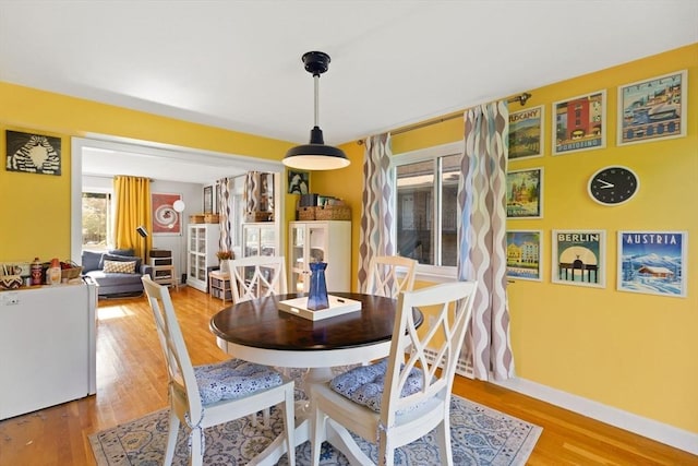 212 Washington St Unit 212, Canton, MA 02021 - dining area with wood finished floors and baseboards