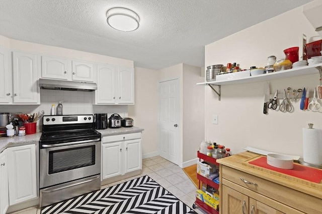 212 Washington St Unit 212, Canton, MA 02021 - kitchen with electric stove, under cabinet range hood, open shelves, white cabinetry, and a textured ceiling