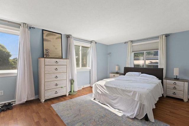 212 Washington St Unit 212, Canton, MA 02021 - bedroom with wood finished floors and baseboards