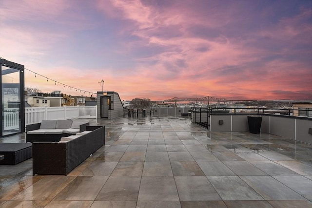 101 Condor St Unit 301A, Boston, MA 02128 - patio terrace at dusk featuring an outdoor hangout area and a patio area