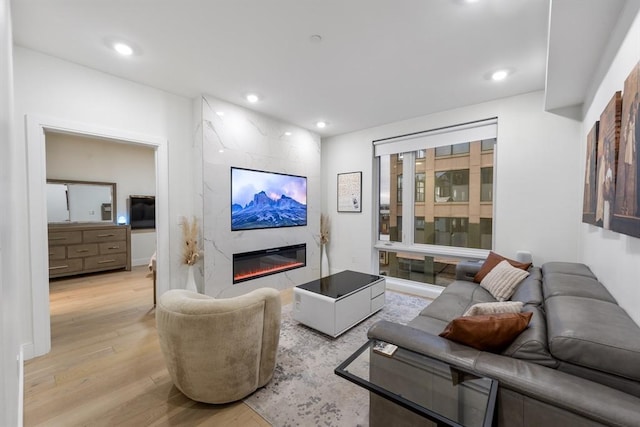 101 Condor St Unit 301A, Boston, MA 02128 - living room featuring wood finished floors, a premium fireplace, and recessed lighting