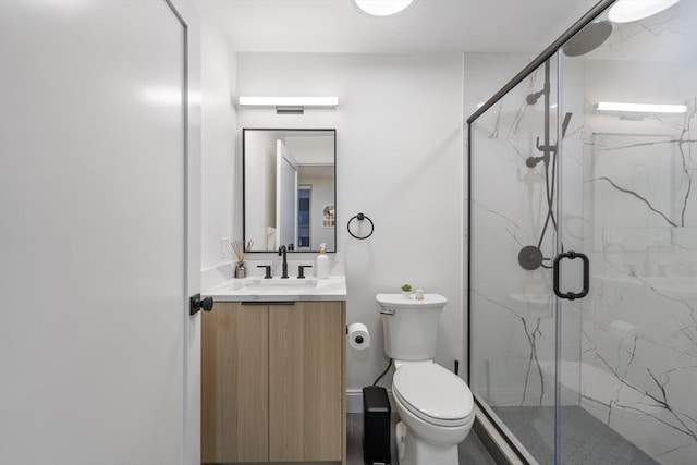 101 Condor St Unit 301A, Boston, MA 02128 - bathroom with vanity, toilet, and a marble finish shower