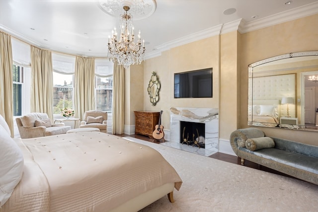 bedroom featuring an inviting chandelier, wood-type flooring, and crown molding