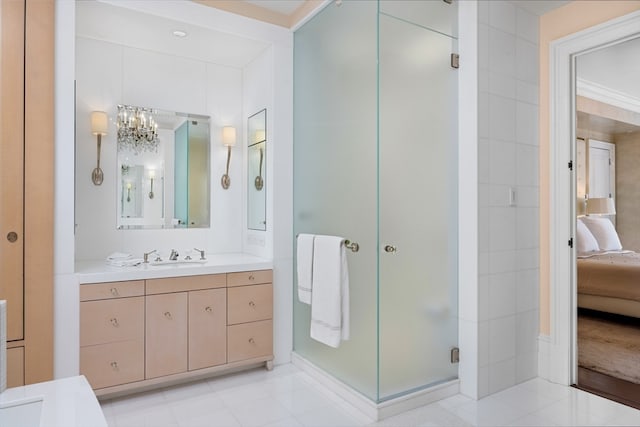 bathroom with ornamental molding, tile patterned flooring, vanity, and an enclosed shower