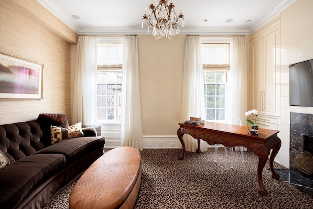 home office featuring a notable chandelier, a fireplace, crown molding, and a wealth of natural light