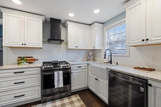 kitchen featuring a sink, white cabinetry, wall chimney exhaust hood, dishwashing machine, and gas range