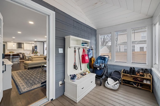 mudroom with recessed lighting, lofted ceiling, and wood finished floors