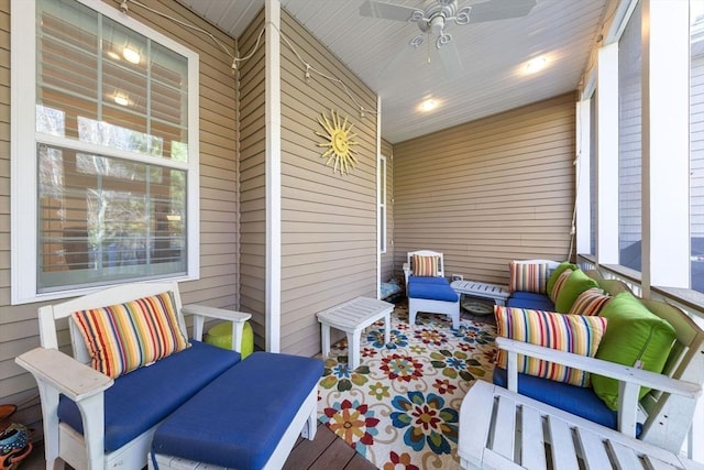 exterior space featuring a porch, a ceiling fan, and an outdoor hangout area
