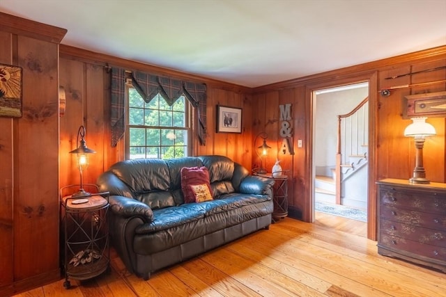 188 Main St, Wilbraham, MA 01095 - living area with light wood-style flooring and wooden walls
