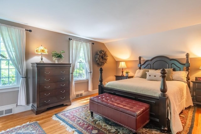 188 Main St, Wilbraham, MA 01095 - bedroom with multiple windows, light wood finished floors, and lofted ceiling