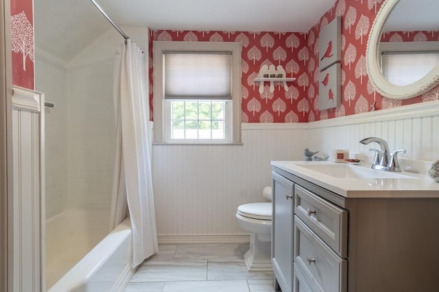 188 Main St, Wilbraham, MA 01095 - bathroom featuring vanity, wallpapered walls, shower / tub combo, and a wainscoted wall