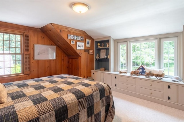 188 Main St, Wilbraham, MA 01095 - bedroom featuring multiple windows, wooden walls, light carpet, and lofted ceiling