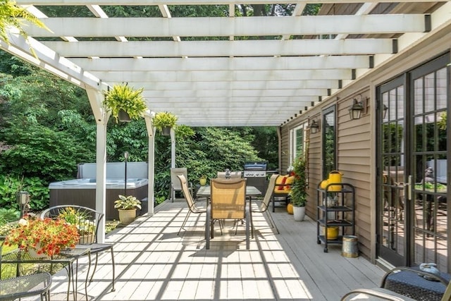 188 Main St, Wilbraham, MA 01095 - wooden deck with a hot tub, outdoor dining area, and a pergola