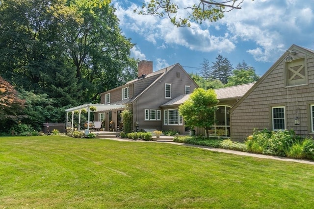 188 Main St, Wilbraham, MA 01095 - back of property featuring a pergola, a chimney, and a yard