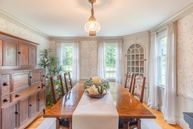188 Main St, Wilbraham, MA 01095 - dining space with wallpapered walls, healthy amount of natural light, and light wood finished floors