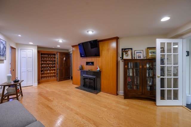 living room with light hardwood / wood-style floors