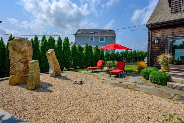 view of yard with a patio area