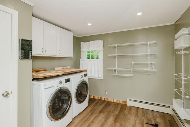 9 Mount Hope St, North Attleboro, MA 02760 - laundry room featuring washing machine and dryer, light wood finished floors, a baseboard radiator, cabinet space, and crown molding