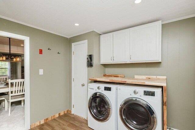 9 Mount Hope St, North Attleboro, MA 02760 - washroom with washing machine and clothes dryer, cabinet space, light wood-style flooring, crown molding, and recessed lighting