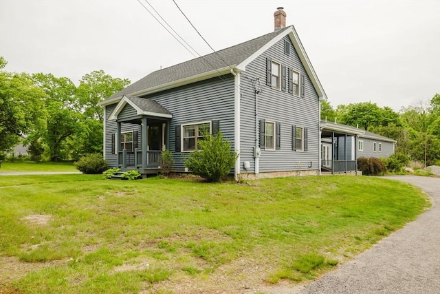 9 Mount Hope St, North Attleboro, MA 02760 - view of side of home featuring a chimney and a yard