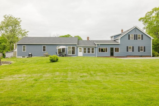 9 Mount Hope St, North Attleboro, MA 02760 - rear view of property with a lawn and a chimney