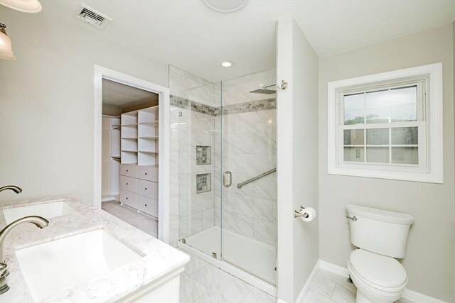 9 Mount Hope St, North Attleboro, MA 02760 - bathroom with vanity, a stall shower, toilet, and baseboards