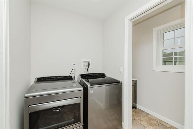 9 Mount Hope St, North Attleboro, MA 02760 - laundry area featuring washer and dryer, baseboards, and light stone finish flooring