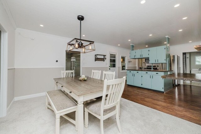 9 Mount Hope St, North Attleboro, MA 02760 - dining space featuring a chandelier, ornamental molding, recessed lighting, light carpet, and baseboards
