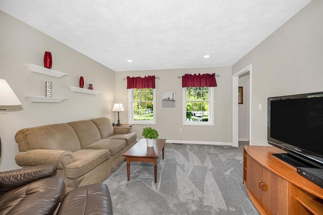 carpeted living room with baseboards and recessed lighting