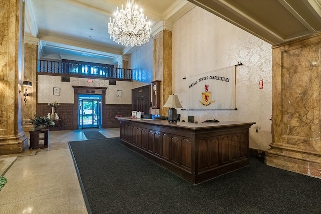 140 Chestnut St Unit 606, Springfield, MA 01103 - reception area with ornamental molding, a chandelier, and a towering ceiling